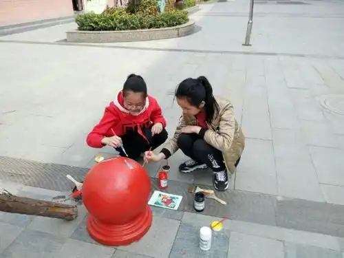 与春天相伴,让校园靓起来记北塘实验小学美术教研组手绘活动
